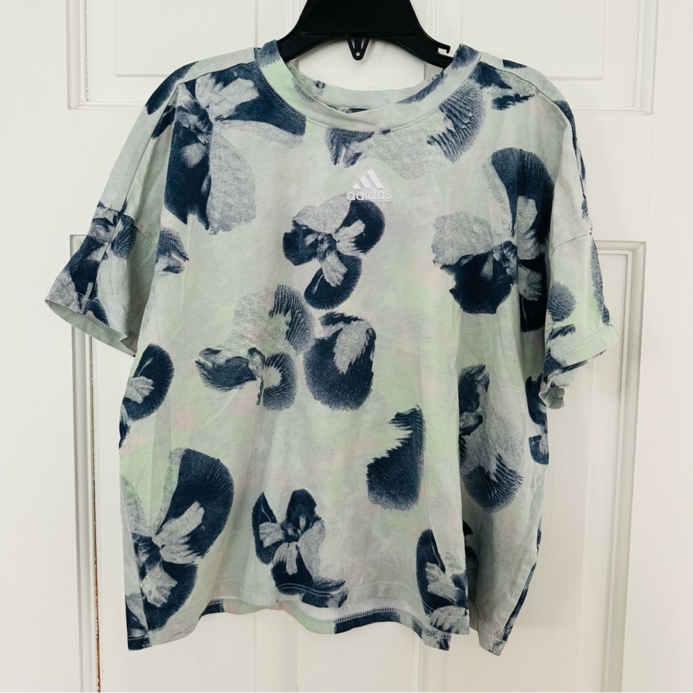 Adidas Girls' All Over Print Loose
Heather Box Short Sleeve Shirt